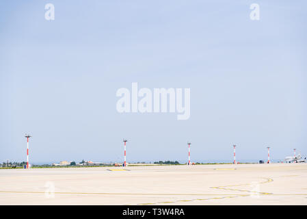 Bari, Italy - March 8, 2019: Airplane rolling down an airport runway. Stock Photo