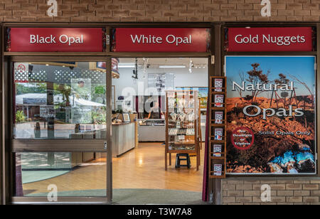 Cairns, Australia - February 18, 2019: Closeup of open door and window facade of jewelry store downtown Kuranda Village, selling gold and opal. Stock Photo