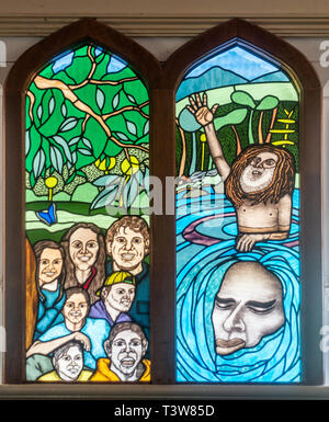 Cairns, Australia - February 18, 2019: Stained glass window of Saint Saviours Church in downtown Kuranda Village. Stock Photo