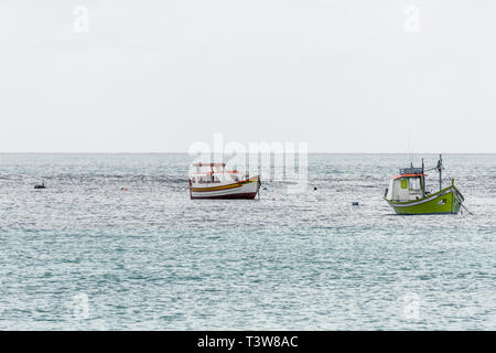 2019, January. Florianopolis, Brazil.FIsher boats at Armacao Beach. Stock Photo