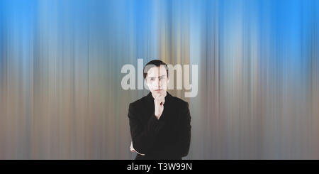 Young scientist on a futuristic background. Stock Photo