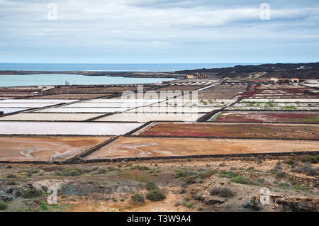 Looking down on the Salinas de Janubio from the roadside Stock Photo