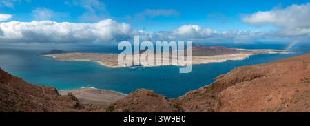 A panorama of the island of La Graciosa taken from close to Mirador del Rio on Lanzarote in the Canary Islands Stock Photo