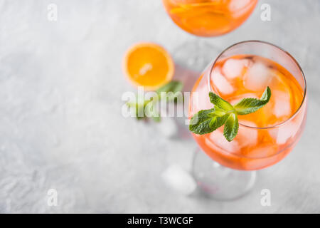 Classic Italian aperol spritz cocktail on light. Close up. Stock Photo