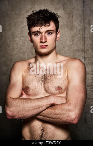 Matty Lee poses for a photo at the Aquatics centre at the Queen