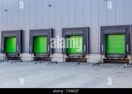 Loading Ramp Door Green loading ramp doors for loading trruck at a distribution center ...