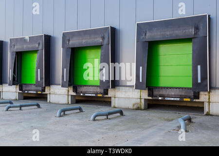 Green loading ramp doors for loading trruck at a distribution center Stock Photo