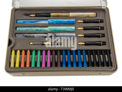A calligraphy pen set with five nibs on an isolated background Stock Photo