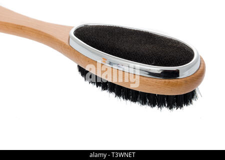 A clothes brush and lint remover brush combination on an isolated Stock Photo