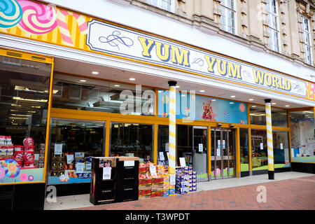 Facade Of Yum Yum World A Sweet Shop & Childrens Soft Play Area, High Street, Rugby, Warwickshire, UK Stock Photo