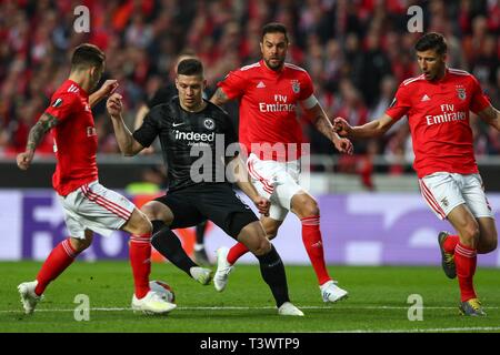 Lisbon, Portugal. 11th Apr, 2019. firo: 11.04.2019, Football, Football: UEFA, EUROPA LEAGUE, EL, Season 2018/2019 Quarter-finals, First leg, Benfica - Eintracht Frankfurt LISBON, PORTUGAL - APRIL 11: Luka Jovic of Eintracht Frankfurt (C) tries to escape Alex Grimaldo of SL Benfica | usage worldwide Credit: dpa/Alamy Live News Stock Photo