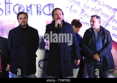 Madrid, Madrid, Spain. 11th Apr, 2019. Spanish left-wing Podemos party leader and presidential candidate for the wing-left Unidas Podemos (United we can) coalition Pablo Iglesias (C), and the general coordinator and lead candidate to the Parliament from Malaga of Unidas Podemos, Alberto Garzon (L), .are seen during a rally to officially launch the party's electoral campaign in Madrid.The 2019 Spanish general election will be held on the 29th April. Credit: John Milner/SOPA Images/ZUMA Wire/Alamy Live News Stock Photo