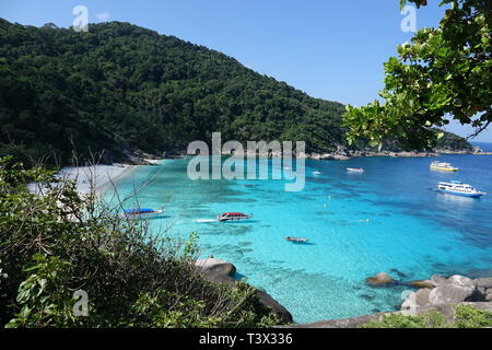 Similan, Thailand. 08th Mar, 2019. Speedboats lie in the crystal clear waters of the 'Ao Kuerk' bay on the island of Ko Similan. Ko Similan is the name-giving island of a total of nine islands in the Andaman Sea. The uninhabited islands together with two other islands form the Mu Ko Similan National Park. Credit: Alexandra Schuler/dpa/Alamy Live News Stock Photo