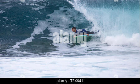 Bodyboarder riding big wave Stock Photo - Alamy