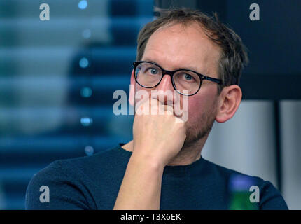 Hamburg Germany. 12th Apr 2019. Michael Ebert editor in chief of SZ Magazin sits on the podium at the reporter workshop of the Spiegel Verlag on the topic Fraud at the editorial office how