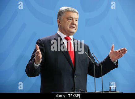 Berlin, Germany. 12th Apr, 2019. Visiting Ukrainian President Petro Poroshenko attends a joint press conference with German Chancellor Angela Merkel (not in the picture) at the German Chancellery in Berlin, capital of Germany, on April 12, 2019. Credit: Shan Yuqi/Xinhua/Alamy Live News Stock Photo