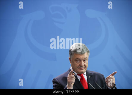 Berlin, Germany. 12th Apr, 2019. Visiting Ukrainian President Petro Poroshenko attends a joint press conference with German Chancellor Angela Merkel (not in the picture) at the German Chancellery in Berlin, capital of Germany, on April 12, 2019. Credit: Shan Yuqi/Xinhua/Alamy Live News Stock Photo