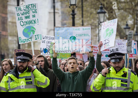 London, UK. 12th April 2019. Students take part in the third Youth Strike 4 Climate. Pupils from schools, colleges and universities walk out from lessons to protest in Westminster for the third Youth Strike 4 Climate / Fridays For Future nationwide climate change protest action. Credit: Guy Corbishley/Alamy Live News