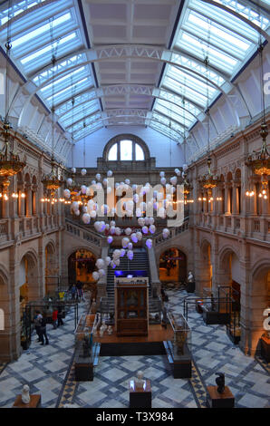 Floating Heads Installation by Sophie Cave, over 50 of them, each displaying different emotions including laughter and despair. Stock Photo