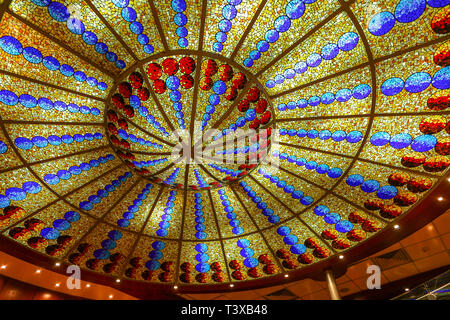 An ornate ceiling and lighting in a cruise ship Stock Photo