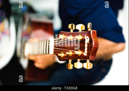 Close up of Ibanez acoustic guitar with gold tuning pegs Stock Photo