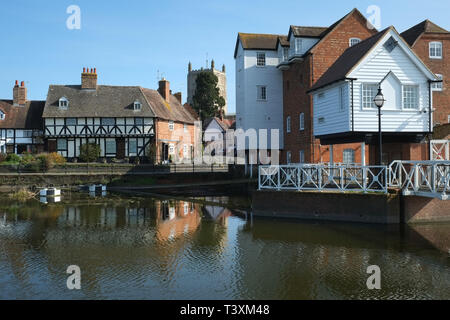 Abbey Flour Mill, Tewkesbury, Gloucestershire, England. The Abbey Tower is in the background Stock Photo