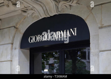 PARIS, FRANCE - JULY 22, 2017: Giorgio Armani black and white sign, fashion luxury store in avenue Montaigne in Paris, France. Stock Photo