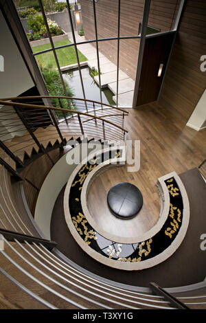 Overhead view of pond in modern foyer Stock Photo