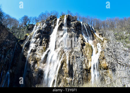 Main waterfall at Plitvice Lakes in Croatia. Beautiful white waterfall during spring. Stock Photo