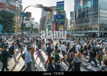 Shibuya, Tokyo, Japan - 05/29/2018: Masses of pedestrians crossing the street at the famous Shibuya crossing. Stock Photo