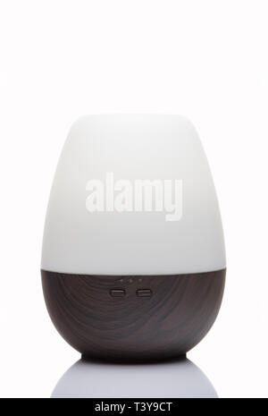Ultrasonic aroma diffuser on a white background. Stock Photo