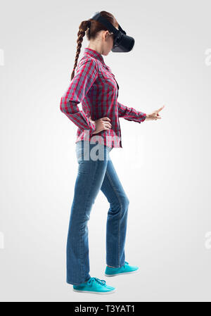 Beautiful girl using virtual reality glasses Stock Photo