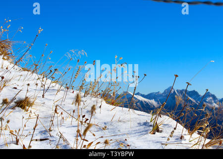 Blue sky and snow on the Nebelhorn in the German Alps Stock Photo