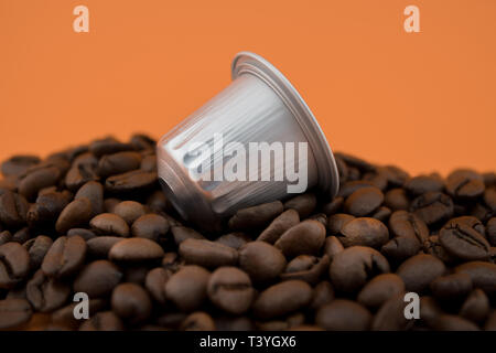 Download Coffee Capsule Or Coffee Pod On Coffee Beans Yellow Background Capsules For Coffee Machine Stock Photo Alamy PSD Mockup Templates