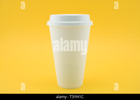 Download Yellow Coffee Paper Cup With Cap Are On Yellow Background Stock Photo Alamy PSD Mockup Templates