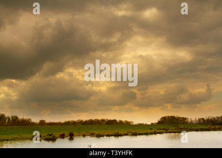 Stormy skies over Fens Stock Photo