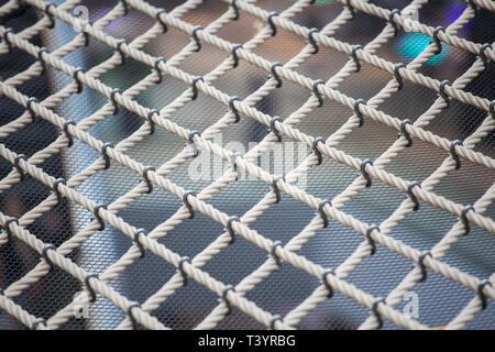 A scale of 250m bouncing net, its highest point will be suspended above ground, will offer visitors a unique experience at Jewel Changi Airport. Stock Photo