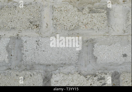 Background from slag stones. The wall put from slag stone. Stock Photo