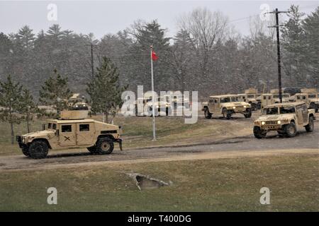 Soldiers conduct operations for Operation Cold Steel III Task Force Fortnite on April 10, 2019, at Range 2 at Fort McCoy, Wis., while a fresh snow comes down. Operation Cold Steel III is a gunnery exercise with Soldiers qualifying on the M2, MK-19, and M240B weapon systems. According to the Army Reserve, the training completed during Operation Cold Steel is critical to ensuring that Army Reserve units and Soldiers are trained and ready to deploy on short notice and bring combat-ready and lethal firepower in support of Army and Joint Force partners around the world. (U.S. Army Photo by Scott T. Stock Photo