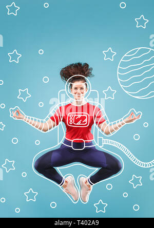 Find her own right way among the stars. Dreaming about cosmonaut profession or travel the cosmos. Young woman in drawing imaginary spacesuit against blue background. Concept of childhood and dreams. Stock Photo