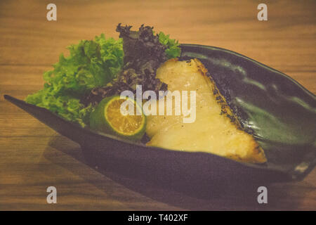 Gindara Grilled Black cod fish over japanese charcoal robatayaki Stock Photo