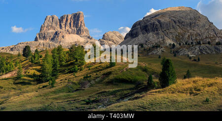 A view of Mount Averau (left) and Nuvolao (right), two peaks in the Dolomiti d'Ampezzo mountain range. Taken from the prairies of Falzarego Pass, a hi Stock Photo