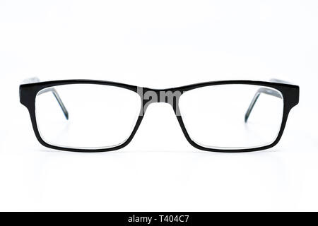 Pair of black glasses with lenses isolated against a plain white background Stock Photo