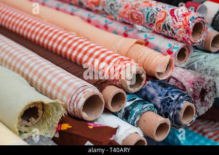 Rolls of  fabrics and textiles. Sewing and fashion industry concept  - Stock Photo