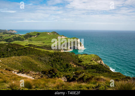 Walking the coastline at Cape Farewell in Nelson district in New Zealand Stock Photo