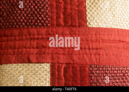 Close up Abstract of silk or satin fabric background of linen cloth textile of red fabric with crisscross diagonal pattern for any occasion. Natural c Stock Photo