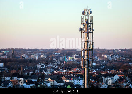 Herten, Ruhr area, North Rhine-Westphalia, Germany - Mobile phone mast in the urban residential area.  Herten, Ruhrgebiet, Nordrhein-Westfalen, Deutsc Stock Photo