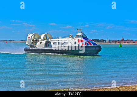 The Hovertravel 'Island Flyer' hovercraft approaches the landing area on Southsea beach near Portsmouth after the crossing from Ryde, Isle of Wight. Stock Photo
