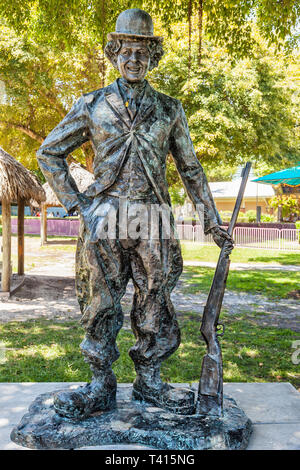Miami, USA - 10. April 2014: This large bronze statue of Charlie Chaplin is one of nine works in Bayfront Park for Art Basel. The exhibit titled WAR t Stock Photo