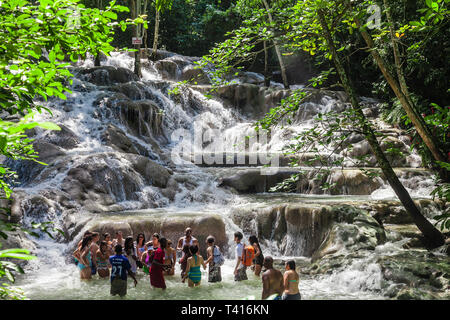 Ocho Rios, Jamaica - November 15, 2016: The Dunn's River Falls are waterfalls in Ocho Rios in Jamaica, which can be climbed by tourists. Stock Photo